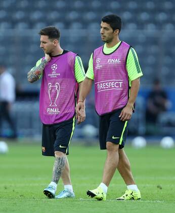 Lionel Messi and Luis Suarez of Barcelona - Training - Juventus vs. Barcelona - Champion s League Final - Olympic Stadium - Berlin - Germany - 05 06 2015 Pic Philip Oldham Sportimage EDITORIAL USE ONLY. No use with unauthorised audio, video, data, fixture lists, club league logos or live services. Online in-match use limited to 120 images, no video emulation. No use in betting, games or single club league player publications.