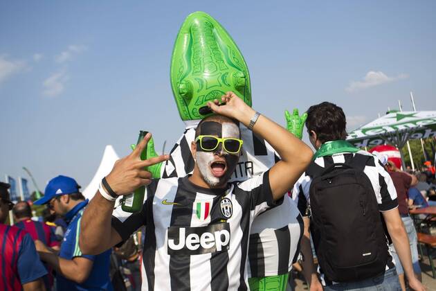 A Juventus fan enjoys the atmosphere with his inflatable crocodile - Juventus Turin vs. FC Barcelona - Champion s League Final - Olympic Stadium - Berlin - Germany - 06 06 2015 Pic Philip Oldham Sportimage EDITORIAL USE ONLY. No use with unauthorised audio, video, data, fixture lists, club league logos or live services. Online in-match use limited to 120 images, no video emulation. No use in betting, games or single club league player publications.