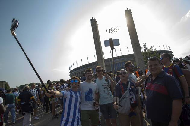 Fans use selphie sticks to take their pictures - Juventus Turin vs. FC Barcelona - Champion s League Final - Olympic Stadium - Berlin - Germany - 06 06 2015 Pic Philip Oldham Sportimage EDITORIAL USE ONLY. No use with unauthorised audio, video, data, fixture lists, club league logos or live services. Online in-match use limited to 120 images, no video emulation. No use in betting, games or single club league player publications.