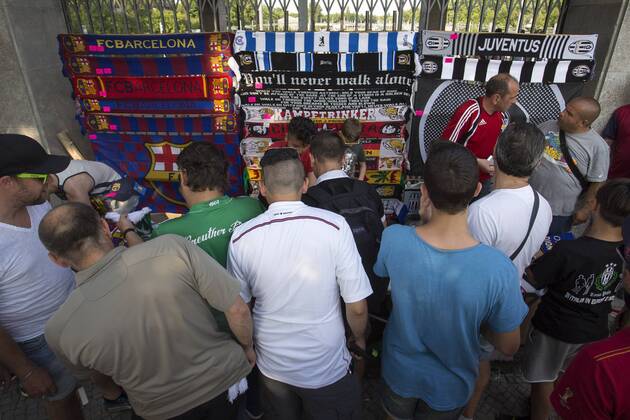 Fans browse merchandise stalls - Juventus Turin vs. FC Barcelona - Champion s League Final - Olympic Stadium - Berlin - Germany - 06 06 2015 Pic Philip Oldham Sportimage EDITORIAL USE ONLY. No use with unauthorised audio, video, data, fixture lists, club league logos or live services. Online in-match use limited to 120 images, no video emulation. No use in betting, games or single club league player publications.