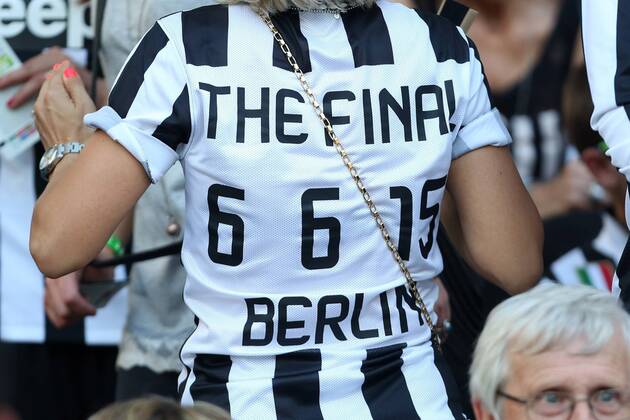 A female fan has a customised shirt message on her back dedicated to the final - Juventus Turin vs. FC Barcelona - Champion s League Final - Olympic Stadium - Berlin - Germany - 06 06 2015 Pic Philip Oldham Sportimage EDITORIAL USE ONLY. No use with unauthorised audio, video, data, fixture lists, club league logos or live services. Online in-match use limited to 120 images, no video emulation. No use in betting, games or single club league player publications.