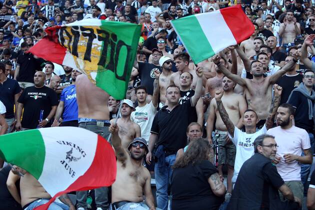 A large section of Juventus fans goes topless - Juventus Turin vs. FC Barcelona - Champion s League Final - Olympic Stadium - Berlin - Germany - 06 06 2015 Pic Philip Oldham Sportimage EDITORIAL USE ONLY. No use with unauthorised audio, video, data, fixture lists, club league logos or live services. Online in-match use limited to 120 images, no video emulation. No use in betting, games or single club league player publications.