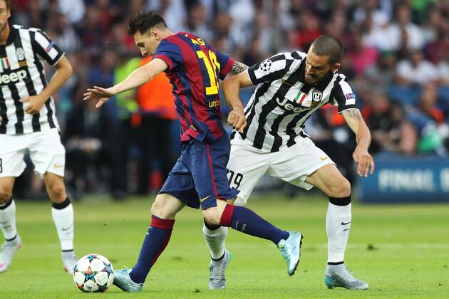SOCCER - CL, Barcelona vs Juventus BERLIN,GERMANY,06.JUN.15 - SOCCER - UEFA Champions League Final, FC Barcelona Barca vs Juventus Turin. Image shows Leonardo Bonucci (Turin) and Lionel Messi (Barcelona). GEPAxpictures xMathiasxMandl