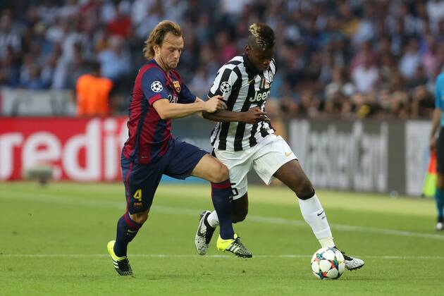 Ivan Rakitic of Barcelona and Juventus Paul Pogba battle - Juventus Turin vs. FC Barcelona - Champion s League Final - Olympic Stadium - Berlin - Germany - 06 06 2015 Pic Philip Oldham Sportimage EDITORIAL USE ONLY. No use with unauthorised audio, video, data, fixture lists, club league logos or live services. Online in-match use limited to 120 images, no video emulation. No use in betting, games or single club league player publications.