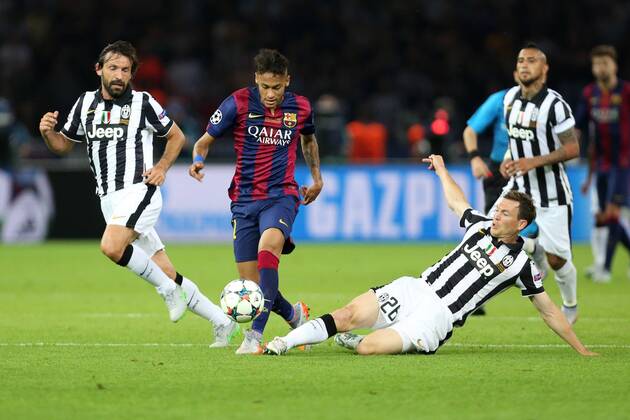 Juventus Stephan Lichtsteiner tackles Neymar of Barcelona - Juventus vs. Barcelona - Champion s League Final - Olympic Stadium - Berlin - Germany - 06 06 2015 Pic Philip Oldham Sportimage EDITORIAL USE ONLY. No use with unauthorised audio, video, data, fixture lists, club league logos or live services. Online in-match use limited to 120 images, no video emulation. No use in betting, games or single club league player publications.