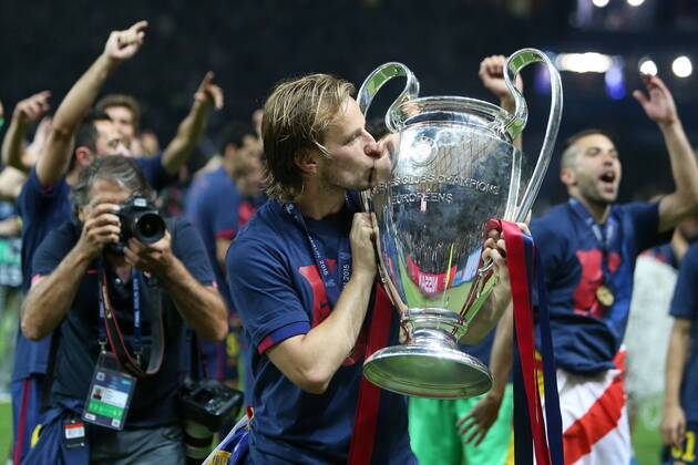 Ivan Rakitic of Barcelona kisses the trophy - Juventus vs. Barcelona - Champion s League Final - Olympic Stadium - Berlin - Germany - 06 06 2015 Pic Philip Oldham Sportimage EDITORIAL USE ONLY. No use with unauthorised audio, video, data, fixture lists, club league logos or live services. Online in-match use limited to 120 images, no video emulation. No use in betting, games or single club league player publications.