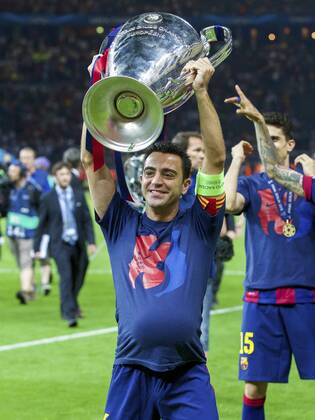 Xavi Hernandez of FC Barcelona Barca with Champions League trophy during the UEFA Champions League final match between Barcelona and Juventus on June 6, 2015 at the Olympic stadium in Berlin, Germany. Barcelona v Juventus Champions League final 2014 2015 xVIxxIVx 3946855