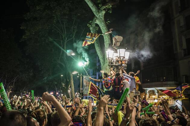 June 6, 2015 - Barcelona, Catalonia, Spain - Cules set of fire works from the Canaletas fountain as they celebrate the fifth Champions League win of the FC Barcelona Barca after beating Juventus Turin 3:1 in the Final. Cules celebrate as Barcelona wins fifth Champions League title - ZUMAo105