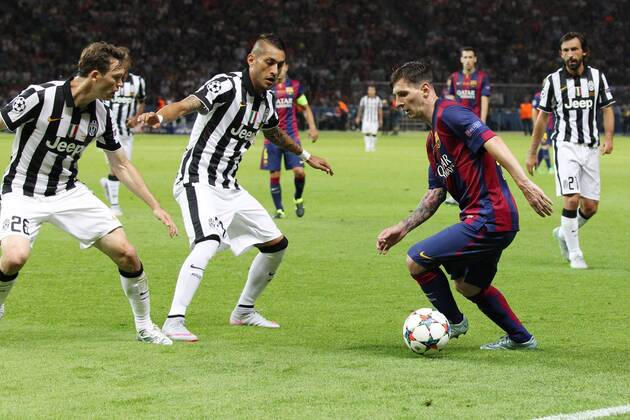 SOCCER - CL, Barcelona vs Juventus BERLIN,GERMANY,06.JUN.15 - SOCCER - UEFA Champions League Final, FC Barcelona Barca vs Juventus Turin. Image shows Stephan Lichtsteiner, Roberto Pereyra (Juventus) and Lionel Messi (Barcelona). GEPAxpictures xMathiasxMandl