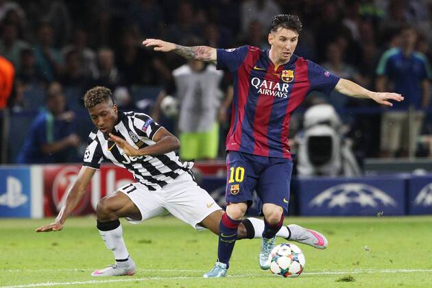 SOCCER - CL, Barcelona vs Juventus BERLIN,GERMANY,06.JUN.15 - SOCCER - UEFA Champions League Final, FC Barcelona Barca vs Juventus Turin. Image shows Lionel Messi (Barcelona) and Kingsley Coman (Juventus). GEPAxpictures xMathiasxMandl