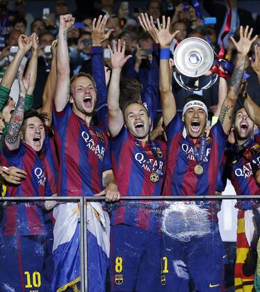 (L-R) Lionel Messi, Ivan Raketic, Andres Iniesta, Neymar of Barcelona celebrating winning the Champions League final during the UEFA Champions League final match between FC Barcelona (Barca) and Juventus Turin on June 6, 2015 at the Olympic stadium in Berlin, Germany. FC Barcelona (Barca) v Juventus Turin - Champions League final 2014 2015 xVIxxIVx 3950632