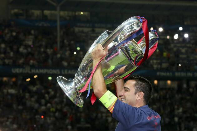 Xavi FC Barcelona Barca 6) feiert mit dem Pokal nach dem Gewinn des Spiels des Champions League Finales zwischen Juventus Turin und dem FC Barcelona am 06.06.2015 im Berliner Olympia Stadion ( Copyright: Schülerx xEibner-Pressefoto EP_jse