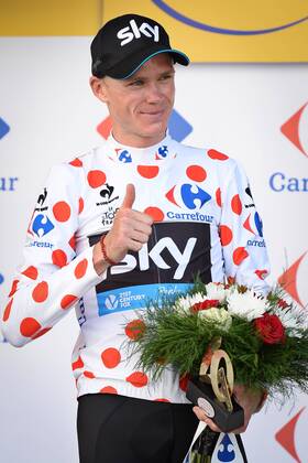 - CAUTERETS, FRANCE: British Chris Froome of Team Sky wearing the red polka-dot jersey for best climber celebrates on the podium after stage 11 of the 2015 edition of the Tour de France cycling race, 188 km from Pau to Vallee de Saint-Savin, Cauterets, France, Wednesday 15 July 2015. This year s Tour de France is taking place from 4 to 26 July. DAVIDxSTOCKMAN  x04664754x