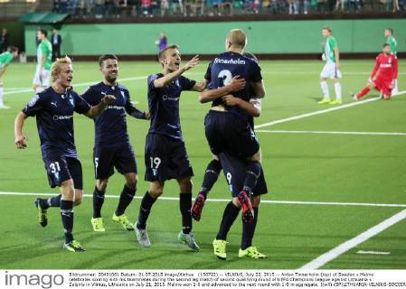 (150722) -- VILNIUS, July 22, 2015 -- Anton Tinnerholm (top) of Sweden s Malmo celebrates scoring with his teammates during the second leg match of second qualifying round of UEFA Champions League against Lithuania s Zalgiris in Vilnius, Lithuania on July 21, 2015. Malmo won 1-0 and advanced to the next round with 1-0 in aggregate. )(wll) (SP)LITHUANIA-VILNIUS-SOCCER-UEFA CHAMPIONS LEAGUE-QUALIFYING ROUND 2-MALMO VS ZALGIRIS BuxPeng 