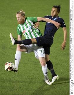 (150722) -- VILNIUS, July 22, 2015 -- Linas Pilibaitis (L) of Lithuania s Zalgiris breaks through during the second leg match of second qualifying round of UEFA Champions League against Sweden s Malmo in Vilnius, Lithuania on July 21, 2015. Malmo won 1-0 and advanced to the next round with 1-0 in aggregate. )(wll) (SP)LITHUANIA-VILNIUS-SOCCER-UEFA CHAMPIONS LEAGUE-QUALIFYING ROUND 2-MALMO VS ZALGIRIS AlfredasxPliadis 