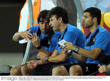 21.07.2015 Skopje(Former Yugoslav Republic Macedonia) FK Vardar-FC Apoel Nicosia UEFA Champions League qualify second leg men s football Domingos Paciencia(c) FC Apoel coach with assistants coaches Bruno Moura(L) and Marinos Satsias(r) : 