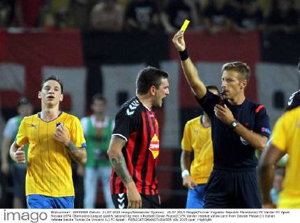 21.07.2015 Skopje(Former Yugoslav Republic Macedonia) FK Vardar-FC Apoel Nicosia UEFA Champions League qualify second leg men s football Goran Popov(C) FK Vardar receive yelow card from Davide Massa (r) Italian referee beside Tomas De Vincenti (L) FC Apoel : 