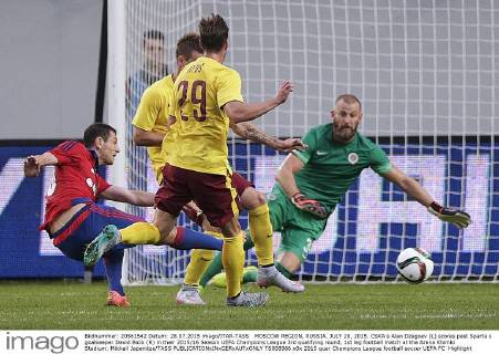 MOSCOW REGION, RUSSIA. JULY 28, 2015. CSKA s Alan Dzagoev (L) scores past Sparta s goalkeeper David Bicik (R) in their 2015 16 Season UEFA Champions League 3rd qualifying round, 1st leg football match at the Arena Khimki Stadium. Mikhail Japaridze TASS  TS008966