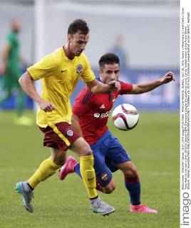 MOSCOW REGION, RUSSIA. JULY 28, 2015. Sparta s Matej Hybs (L) and CSKA s Zoran Tosic fight for the ball in their 2015 16 Season UEFA Champions League 3rd qualifying round, 1st leg football match at the Arena Khimki Stadium. Mikhail Japaridze TASS  TS00896A