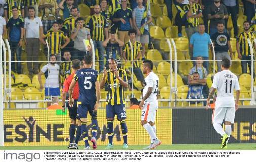 UEFA Champions League third qualifying round match between Fenerbahce and Shakhtar Donetsk at Sukru Saracoglu Stadium in Istanbul, Turkey, 28 July 2015 Pictured: Bruno Alves of Fenerbahce and Alex Teixeira of Shakhtar Donetsk. 