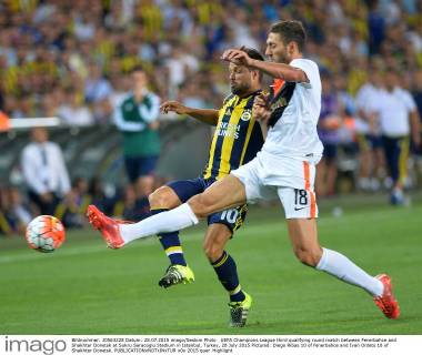 UEFA Champions League third qualifying round match between Fenerbahce and Shakhtar Donetsk at Sukru Saracoglu Stadium in Istanbul, Turkey, 28 July 2015 Pictured: Diego Ribas 10 of Fenerbahce and Ivan Ordets 18 of Shakhtar Donetsk. 