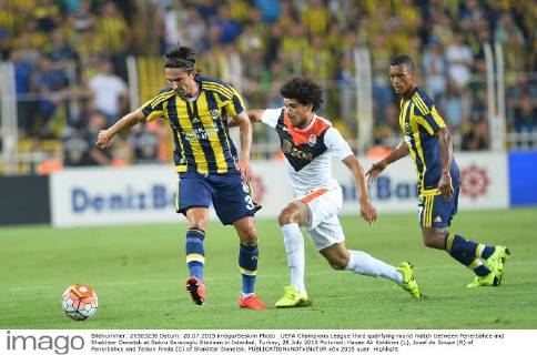 UEFA Champions League third qualifying round match between Fenerbahce and Shakhtar Donetsk at Sukru Saracoglu Stadium in Istanbul, Turkey, 28 July 2015 Pictured: Hasan Ali Kaldirim (L), Josef de Souza (R) of Fenerbahce and Taison Freda (C) of Shakhtar Donetsk. 
