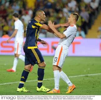 UEFA Champions League third qualifying round match between Fenerbahce and Shakhtar Donetsk at Sukru Saracoglu Stadium in Istanbul, Turkey, 28 July 2015 Final Score : Fenerbahce 0 - Shakhtar Donetsk 0 Pictured: Jose Fernandoa (L) of Fenerbahce and Vyacheslav Shevchuk 13 of Shakhtar Donetsk. 