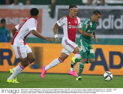 SOCCER - CL quali, Rapid vs Ajax VIENNA,AUSTRIA,29.JUL.15 - SOCCER - UEFA Champions League, qualification, SK Rapid Wien vs AFC Ajax Amsterdam. Image shows Anwar El Ghazi (Ajax) and Steffen Hofmann (Rapid). Keywords: Wien Energie. GEPAxpictures xChristianxOrt