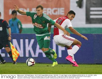 SOCCER - CL quali, Rapid vs Ajax VIENNA,AUSTRIA,29.JUL.15 - SOCCER - UEFA Champions League, qualification, SK Rapid Wien vs AFC Ajax Amsterdam. Image shows Stefan Stangl (Rapid) and Anwar El Ghazi (Ajax). Keywords: Wien Energie. GEPAxpictures xChristianxOrt