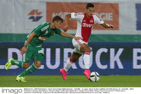 SOCCER - CL quali, Rapid vs Ajax VIENNA,AUSTRIA,29.JUL.15 - SOCCER - UEFA Champions League, qualification, SK Rapid Wien vs AFC Ajax Amsterdam. Image shows Stefan Stangl (Rapid) and Anwar El Ghazi (Ajax). Keywords: Wien Energie. GEPAxpictures xMarioxKneisl