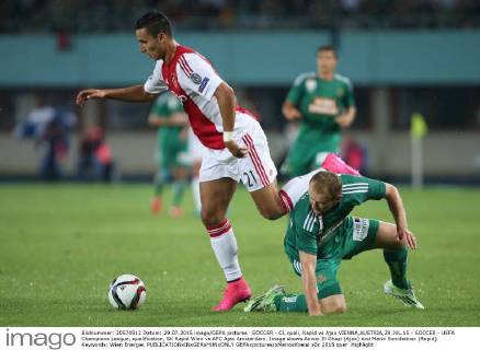 SOCCER - CL quali, Rapid vs Ajax VIENNA,AUSTRIA,29.JUL.15 - SOCCER - UEFA Champions League, qualification, SK Rapid Wien vs AFC Ajax Amsterdam. Image shows Anwar El Ghazi (Ajax) and Mario Sonnleitner (Rapid). Keywords: Wien Energie. GEPAxpictures xMarioxKneisl