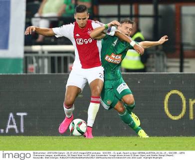 SOCCER - CL quali, Rapid vs Ajax VIENNA,AUSTRIA,29.JUL.15 - SOCCER - UEFA Champions League, qualification, SK Rapid Wien vs AFC Ajax Amsterdam. Image shows Anwar El Ghazi (Ajax) and Stefan Stangl (Rapid). Keywords: Wien Energie. GEPAxpictures xChristianxOrt