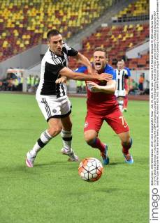 July 29, 2015: Miroslav Vulicevic 4 of Partizan Belgrade FK SRB and Adrian Popa 77 of FC Steaua Bucharest in action during the UEFA Champions League Third Qualifying Round 2015-2016 game between FC Steaua Bucharest ROU and Partizan Belgrade FK SRB at National Arena, Bucharest, Romania ROU. Foto: UEFA Champions League Third Qualifying Round 2015-2016 game between FC Steaua Bucharest ROU and Partizan Belgrade FK SRB July 2015 - ZUMAc04_