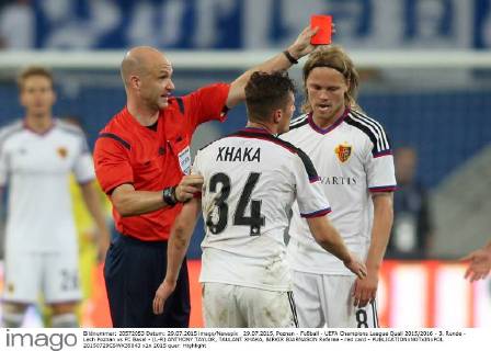 29.07.2015, Poznan - Fußball - UEFA Champions League Quali 2015 2016 - 3. Runde - Lech Poznan vs FC Basel - (L-R) ANTHONY TAYLOR, TAULANT XHAKA, BIRKIR BJARNASON Referee - red card -  20150729CSWK35043