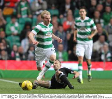 Aktuell FuÃŸball, Champions League Quali, Celtic Glasgow - Qarabag Agdam 29.07.2015. Glasgow, Scotland. Champions League Third Qualifying Round First Leg. Celtic versus FK Qarabag. Gary Mackay-Steven is fouled by Ansi Agolli xVagelisxGeorgarioux  ActionPlus11644939