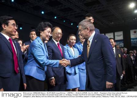 (150731) -- KUALA LUMPUR, July 31, 2015 -- President of the International Olympic Committee (IOC) Thomas Bach (R) shakes hands with Liu Yandong, Chinese Vice Premier and head of Beijing 2022 Winter Olympics bid Delegation, after Beijing won the bid at the 128th International Olympic Committee session in Kuala Lumpur, Malaysia, Friday, July 31, 2015. ) (SP)MALAYSIA-KUALA LUMPUR-IOC-2022 WINTER OLYMPICS-BEIJING LuixSiuxWai 