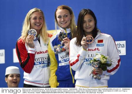SWIMMING - FINA World Championships 2015 KAZAN,RUSSIA,03.AUG.15 - SWIMMING - FINA World Championships 2015, 100m butterfly, women, award ceremony. Image shows Jeanette Ottesen (DEN), Sarah Sjostrom (SWE) and Ying Lu (CHN). Keywords: medal. GEPAxpictures xPhilippxBrem
