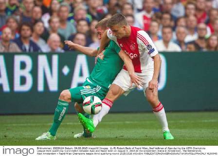 (L-R) Robert Beric of Rapid Wien, Joel Veltman of Ajax during the UEFA Champions League third qualifying round match between Ajax and Rapid Wien on August 4, 2015 at the Amsterdam Arena in Amsterdam, The Netherlands. Ajax Amsterdam v Rapid Wien Champions league third qualifying round 2015 2016 xVIxxIVx 4160948