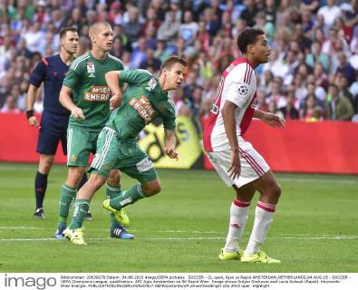 SOCCER - CL quali, Ajax vs Rapid AMSTERDAM,NETHERLANDS,04.AUG.15 - SOCCER - UEFA Champions League, qualification, AFC Ajax Amsterdam vs SK Rapid Wien. Image shows Srdjan Grahovac and Louis Schaub (Rapid). Keywords: Wien Energie. GEPAxpictures xM.xHoermandinger