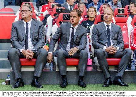 (L-R) assistant trainer Henny Spijkerman of Ajax, coach Frank de Boer of Ajax, assistant trainer Dennis Bergkamp of Ajax during the UEFA Champions League third qualifying round match between Ajax and Rapid Wien on August 4, 2015 at the Amsterdam Arena in Amsterdam, The Netherlands. Ajax Amsterdam v Rapid Wien Champions league third qualifying round 2015 2016 xVIxxIVx 4161007