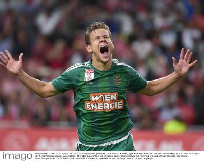 SOCCER - CL quali, Ajax vs Rapid AMSTERDAM,NETHERLANDS,04.AUG.15 - SOCCER - UEFA Champions League, qualification, AFC Ajax Amsterdam vs SK Rapid Wien. Image shows the rejoicing of Louis Schaub (Rapid). Keywords: Wien Energie. GEPAxpictures xM.xHoermandinger