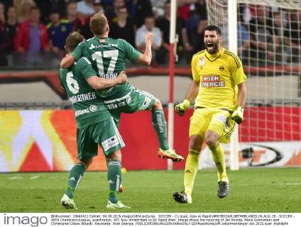 SOCCER - CL quali, Ajax vs Rapid AMSTERDAM,NETHERLANDS,04.AUG.15 - SOCCER - UEFA Champions League, qualification, AFC Ajax Amsterdam vs SK Rapid Wien. Image shows the rejoicing of Jan Novota, Mario Sonnleitner and Christopher Dibon (Rapid). Keywords: Wien Energie. GEPAxpictures xM.xHoermandinger
