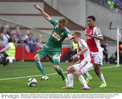 SOCCER - CL quali, Ajax vs Rapid AMSTERDAM,NETHERLANDS,04.AUG.15 - SOCCER - UEFA Champions League, qualification, AFC Ajax Amsterdam vs SK Rapid Wien. Image shows Robert Beric (Rapid), Daley Sinkgraven and Ricardo Van Rhijn (Ajax). Keywords: Wien Energie. GEPAxpictures xM.xHoermandinger