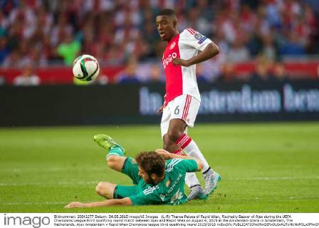(L-R) Thanos Petsos of Rapid Wien, Riechedly Bazoer of Ajax during the UEFA Champions League third qualifying round match between Ajax and Rapid Wien on August 4, 2015 at the Amsterdam Arena in Amsterdam, The Netherlands. Ajax Amsterdam v Rapid Wien Champions league third qualifying round 2015 2016 xVIxxIVx 4161508