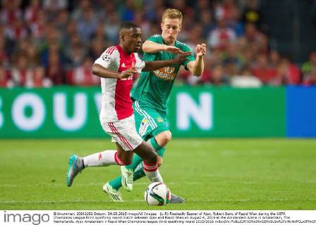 (L-R) Riechedly Bazoer of Ajax, Robert Beric of Rapid Wien during the UEFA Champions League third qualifying round match between Ajax and Rapid Wien on August 4, 2015 at the Amsterdam Arena in Amsterdam, The Netherlands. Ajax Amsterdam v Rapid Wien Champions league third qualifying round 2015 2016 xVIxxIVx 4161523
