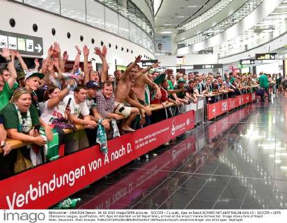SOCCER - CL quali, Ajax vs Rapid SCHWECHAT,AUSTRIA,04.AUG.15 - SOCCER - UEFA Champions League, qualification, AFC Ajax Amsterdam vs SK Rapid Wien, arrival at the airport Vienna-Schwechat. Image shows fans of Rapid Wien. Keywords: Wien Energie. GEPAxpictures xM.xHoermandinger