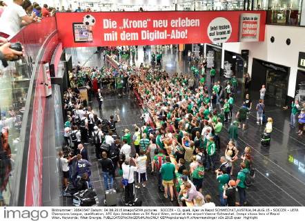 SOCCER - CL quali, Ajax vs Rapid SCHWECHAT,AUSTRIA,04.AUG.15 - SOCCER - UEFA Champions League, qualification, AFC Ajax Amsterdam vs SK Rapid Wien, arrival at the airport Vienna-Schwechat. Image shows fans of Rapid Wien. Keywords: Wien Energie. GEPAxpictures xM.xHoermandinger