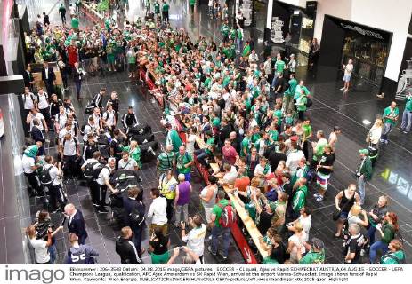 SOCCER - CL quali, Ajax vs Rapid SCHWECHAT,AUSTRIA,04.AUG.15 - SOCCER - UEFA Champions League, qualification, AFC Ajax Amsterdam vs SK Rapid Wien, arrival at the airport Vienna-Schwechat. Image shows fans of Rapid Wien. Keywords: Wien Energie. GEPAxpictures xM.xHoermandinger