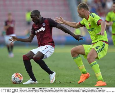 Kehinde Fatai, of Sparta, left to right, and Aleksei Berezutski of CSKA Moscow in action during the third qualifying round of the Champions League return match between AC Sparta Prague and CSKA Moscow in Prague, Czech Republic, on Wednesday, August 5, 2015. (CTKxPhoto KaterinaxSulova) CTKPhotoP201508050789001  suk4