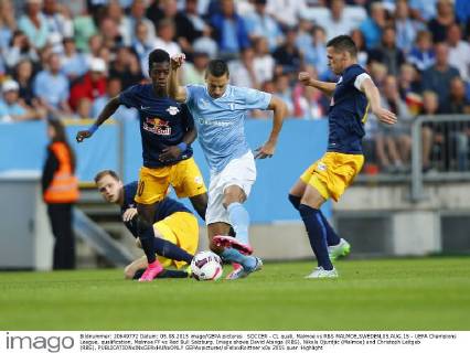 SOCCER - CL quali, Malmoe vs RBS MALMOE,SWEDEN,05.AUG.15 - UEFA Champions League, qualification, Malmoe FF vs Red Bull Salzburg. Image shows David Atanga (RBS), Nikola Djurdjic (Malmoe) and Christoph Leitgeb (RBS). GEPAxpictures xFelixxRoittner